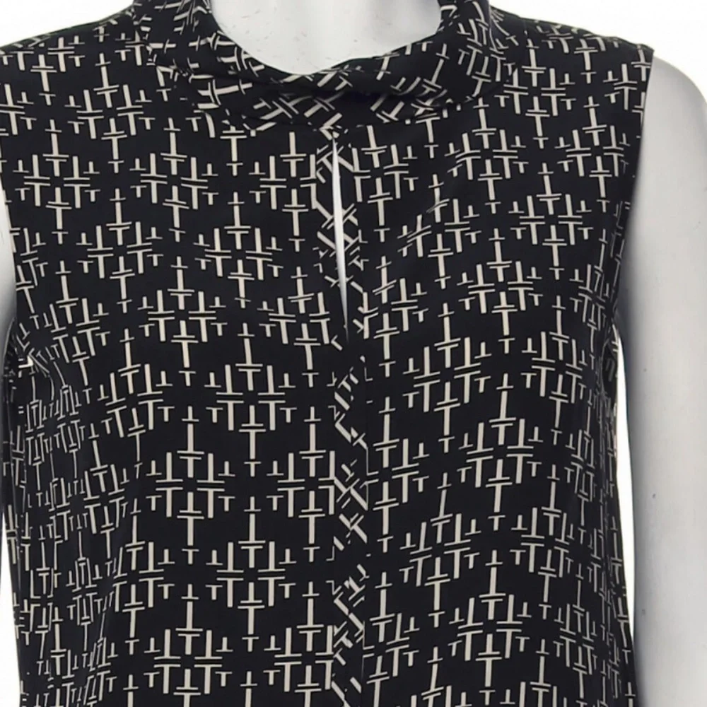 Tory Burch t logo sleeveless‎ top. Never worn. Really nice!